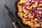 Breakfast concept, Homemade slice of shortbread dough raspberry pie with almond petals