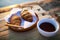 Breakfast with croissant and tea on the beach near the sea at sunrise.