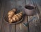 Breakfast with croissants and coffee. Cone-colored ceramic teaspoon and teaspoon