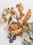 Breakfast with croissants, ricotta, coffee and berries over marble background