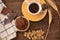 Breakfast cup coffe espresso black cereals muffin milk chocolate pieces on table morning food