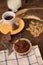 Breakfast cup coffe espresso black cereals muffin milk chocolate pieces on table morning food