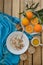 breakfast, fruit, corn flakes, milk and orange juice on the wooden table