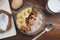 Breakfast with Granola Bowl, Muesli with Oats, Nuts and Dried Fruit, Milk, on Wooden table. Bannana, nuts, fruits. Healthy Breakfa