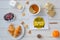 Breakfast from hot croissants, butter,tea and currants on wooden table. Flat lay