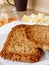 Breakfast with integral toast, butter and apricot jam on wooden table