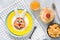 Breakfast for kids. Easter Bunny pancake, honey and cornflakes