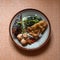 breakfast menu, fish, vegetables, round tofu, and chili sauce.