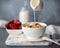 Breakfast with muesli, strawberries and milk