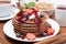 Breakfast with pancakes with cream, fresh berries