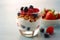 Breakfast parfait made from Greek yogurt and granola topped with fresh berries Generative AI