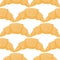 Breakfast seamless isolated pattern with tasty croissants silhouettes. Orange tones bakery elements on white background