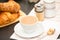 Breakfast Served in the morning with Hot black coffee and croissants Natural corn flake breakfast cereal in cups and fruit on the