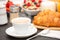 Breakfast Served in the morning with Hot black coffee and croissants Natural corn flake breakfast cereal in cups and fruit on the