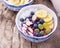 Breakfast smoothie bowl with fruits and granola