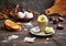 Breakfast still life. Boiled soft-boiled egg on a stand with a spoon, with slices of toast bread, with pieces of eggshell.