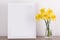 Breakfast still life., empty picture frame mockup on wooden desk, table. . Elegant working space, home office concept. Scandinavia