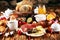 Breakfast on table with bread buns, croissants, coffe and juice