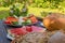 Breakfast table in the garden with various vegetarian and vegan snacks