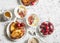 Breakfast table. Greek yogurt with cherries and honey and caramel french toast on white table, top view. Flat lay. Summer breakfas