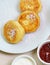 Breakfast table with porridge and cheese pancakes