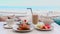 Breakfast on Table with Sea View, Iced Coffee, Teapot, Belgian Waffles, Pancake