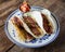 Breakfast tacos with kielbasa sausage tacos, eggs and cilanro