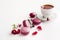 Breakfast tea with roses and french cookies. Valentines and womens day concept. Copy space