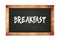 BREAKFAST text written on wooden frame school blackboard