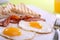 Breakfast - toasts, eggs, bacon