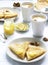 Breakfast for two with pancakes, lemon cream and tea. Breakfast on Valentine`s Day.