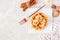 Breakfast waffle with bananas and walnuts, above view table scene over white marble