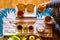 Breakfasy healthy morning time viewed from vertical above view  people woman with toasted bread and marmalades on a wooden tble