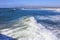 Breaking waves as taken from a pier