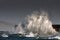 Breaking waves over Holyhead Breakwater