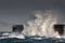 Breaking waves over Holyhead Breakwater