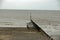 Breakwater, beach and sea