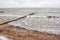 Breakwater covered by ice