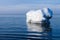 The breakwater in the form of an iceberg in a Sunny winter day.