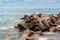 Breakwater of large stones on the beach