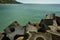 Breakwater moles as part of a seascape from the pier of Gordons Bay harbor