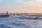 Breakwater pier coast sunset view dusk dawn ocean rough seas waves blue