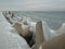 Breakwater, pier covered with snow. Baltic coast, Latvia