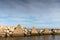 Breakwater pyramidal constructions at the mouth of a river to the sea