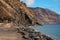 Breakwater rocky volcanic mountains and Atlantic Ocean