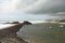 Breakwater and storm Bude Cornwall