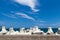 Breakwater structure with concrete blocks under cloudy sky