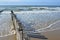 Breakwaters on the beach at the north sea in Domburg Holland