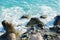 Breakwaters on the black sea coast in Crimea. Seascape. Concrete breakwaters against the blue sea surface.