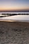 breakwaters during sunset on the Baltic. Long exposure.